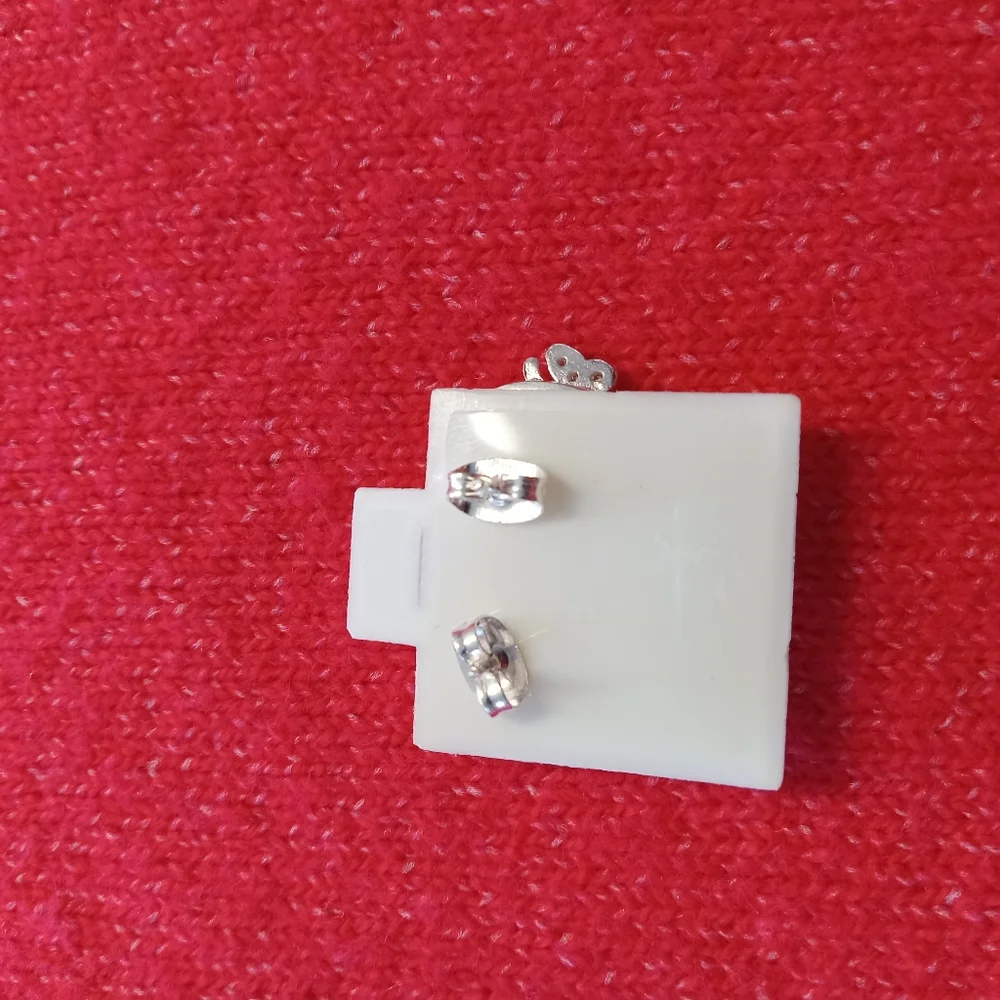 Sterling Silver with‎ zircon Angel post stud earrings.